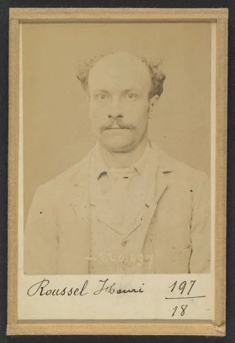 Roussel. Henri-Louis. 28 ans, né à Paris le 2/10/65. Ardoiseur. Anarchiste. 2/7/94. by Alphonse Bertillon, photograph, 1894