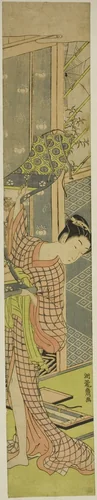 Young Woman Hanging a Painting by Isoda Koryusai, print, 1766-1776