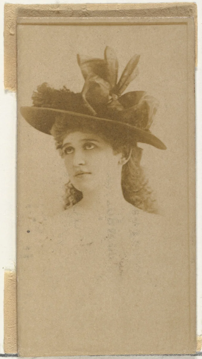 [Actress wearing hat with ornate ribbons], from the Actors and Actresses series (N145-8) issued by Duke Sons & Co. to promote Duke Cigarettes by W. Duke, Sons & Co., photograph, 1890-1895