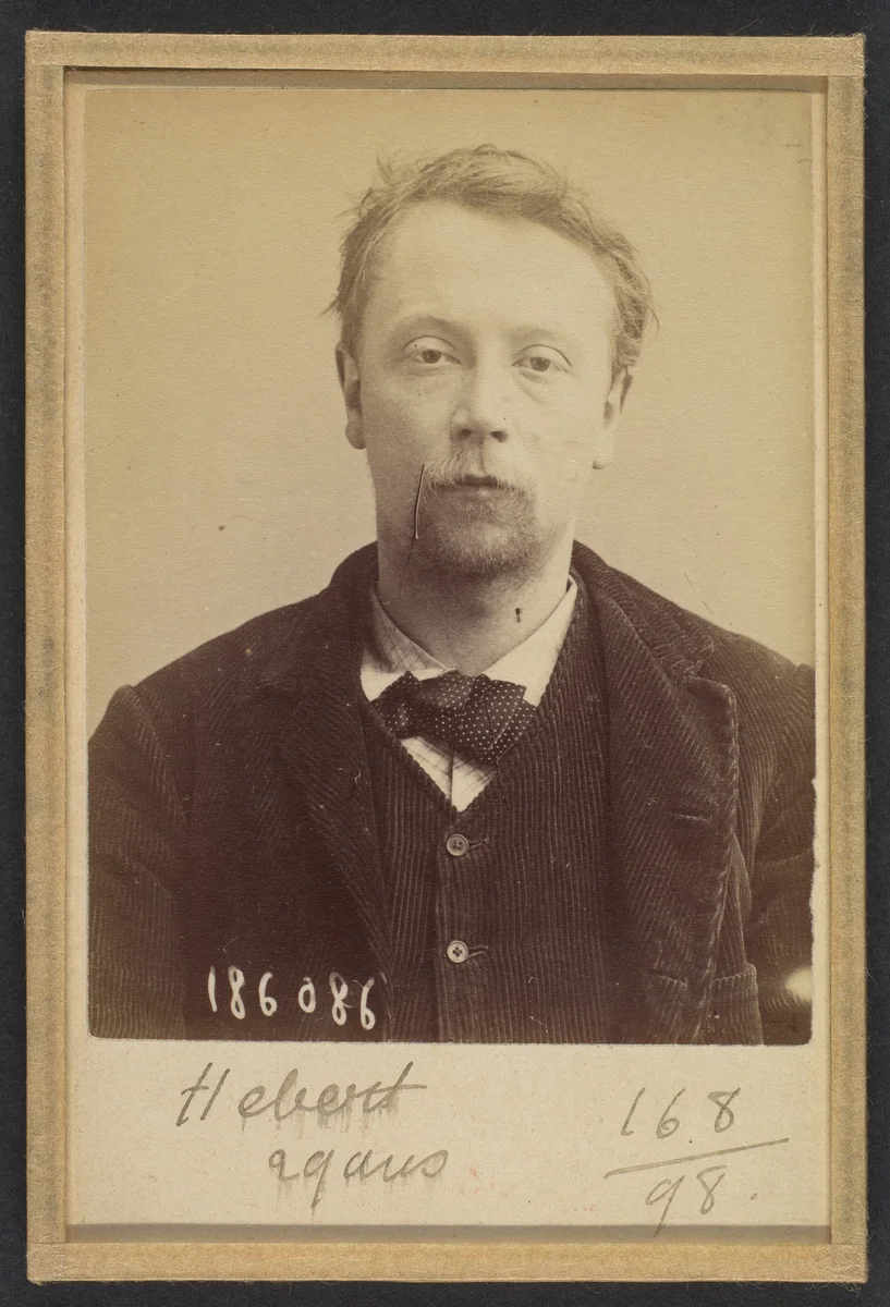 Hébert. Georges, Henri. 27 (ou 29) ans, né à Bayeux (Calvados). Menuisier. Anarchiste. 23/4/92. by Alphonse Bertillon, photograph, 1892