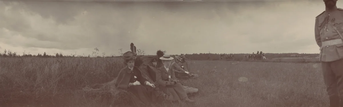 Grand Duchess Xenia Alexandrovna, Empress Alexandra Feodorovna and Grand Duke Alexander Mikhailovich Seated in a Field, Ropsha by Unidentified Photographer, photograph, 1907