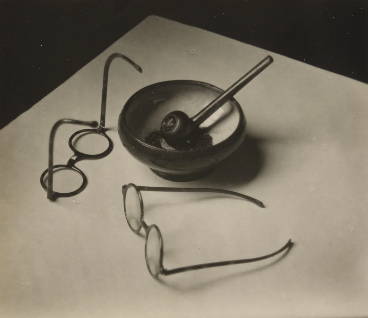 Mondrian's Glasses and Pipe by André Kertész, photograph, 1926