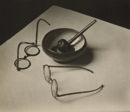 Mondrian's Glasses and Pipe by André Kertész, photograph, 1926