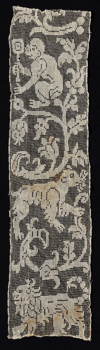 Fragment of a Band with Vines Surrounding a Monkey, Lion, and an Unidentified Four-Legged Animal by Unknown, textile, 1500-1599