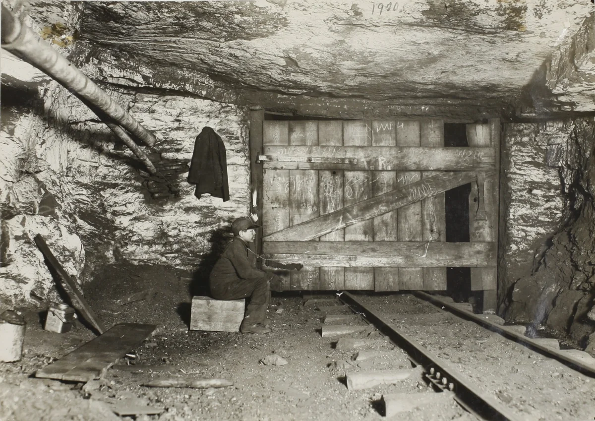 Boy Waiting for Coal to Come Thru by Lewis Wickes Hine, photograph, 1911