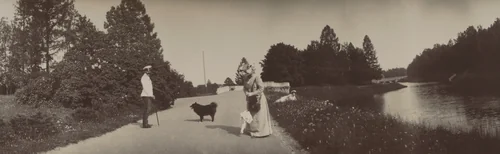 Grand Duke Georgii Mikhailovich Standing on Right, Grand Duchess Olga Alexandrovna Lying in Grass by Unidentified Photographer, photograph, 1903