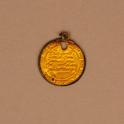 Dinar by al Hakim Abu 'Ali al Mansur, metalwork, 973-1023