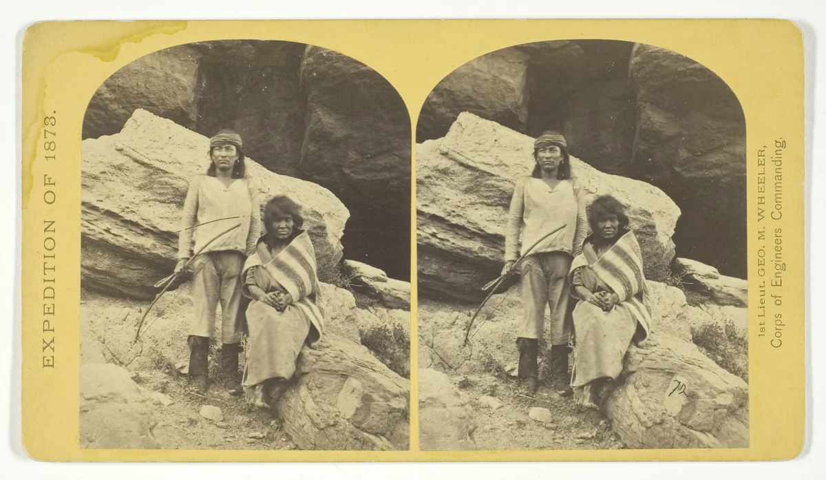 Navajo Brave and his Mother. The Navajo were formerly a warlike tribe until subdued by U.S. Troops, in 1859-60. Many of them now have fine flocks, and herds of horses, sheeps and goats, No. 29 from the series "Geographical Explorations and Surveys West of the 100th Meridian" by Timothy O'Sullivan, photograph, 1873