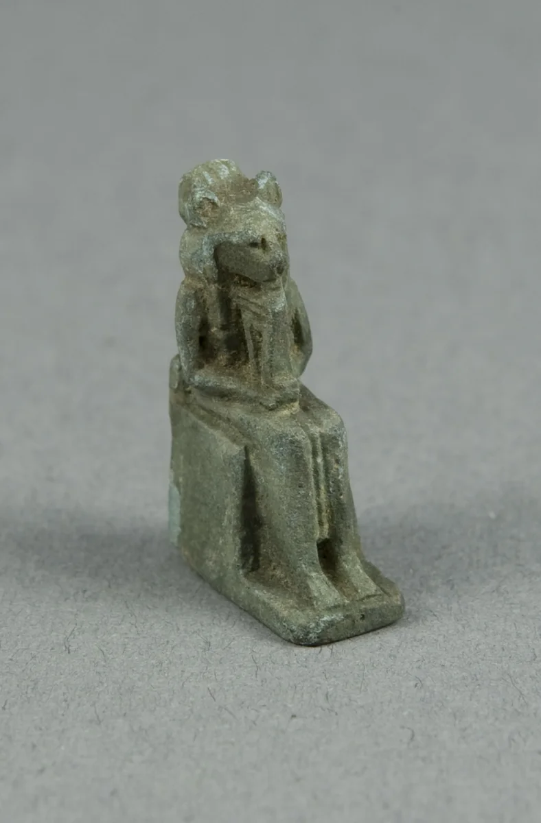 Amulet of a Seated Lion-headed Goddess Holding a Sistrum, possibly Bastet by Egyptian, metalwork, -945--664