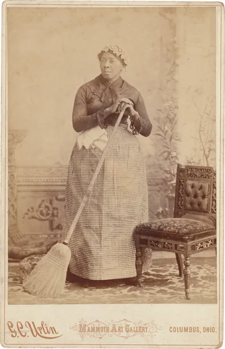 Portrait of a Woman with a Broom by G. C. Urlin, photograph, 1880-1890