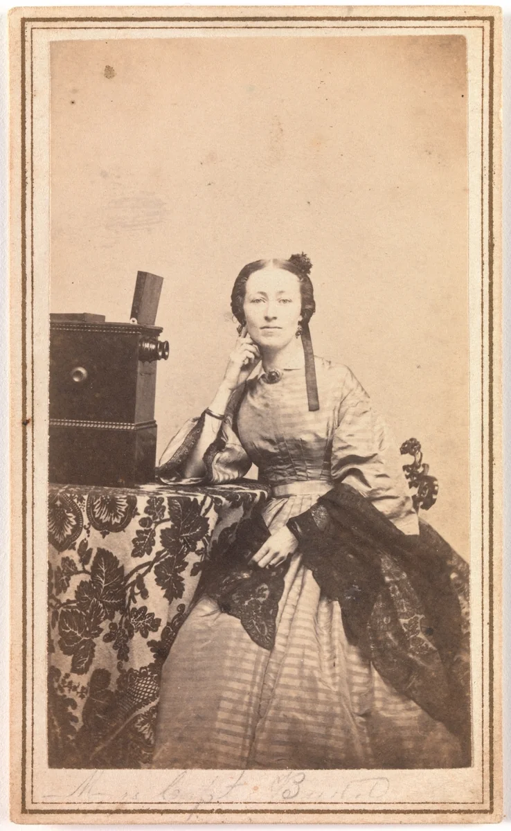 [Young Woman with Beckers Tabletop Stereoscope] by Porter Photograph Parlors, photograph, 1864-1866