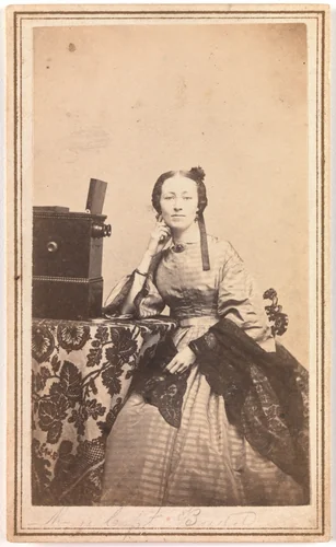 [Young Woman with Beckers Tabletop Stereoscope] by Porter Photograph Parlors, photograph, 1864-1866