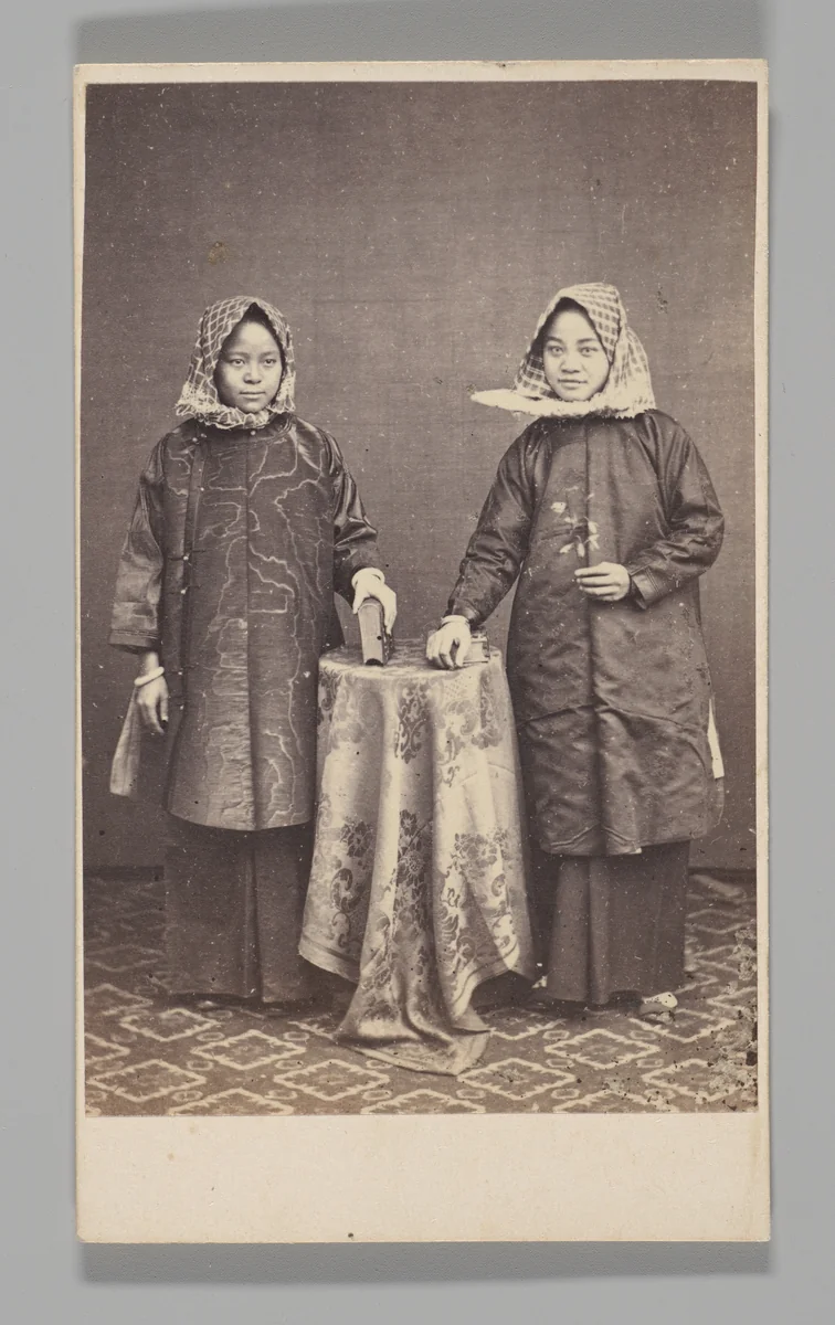 [Studio Portrait: Two Women Standing Beside a Table, Hong Kong] by Pun-Lun, photograph, 1860-1879