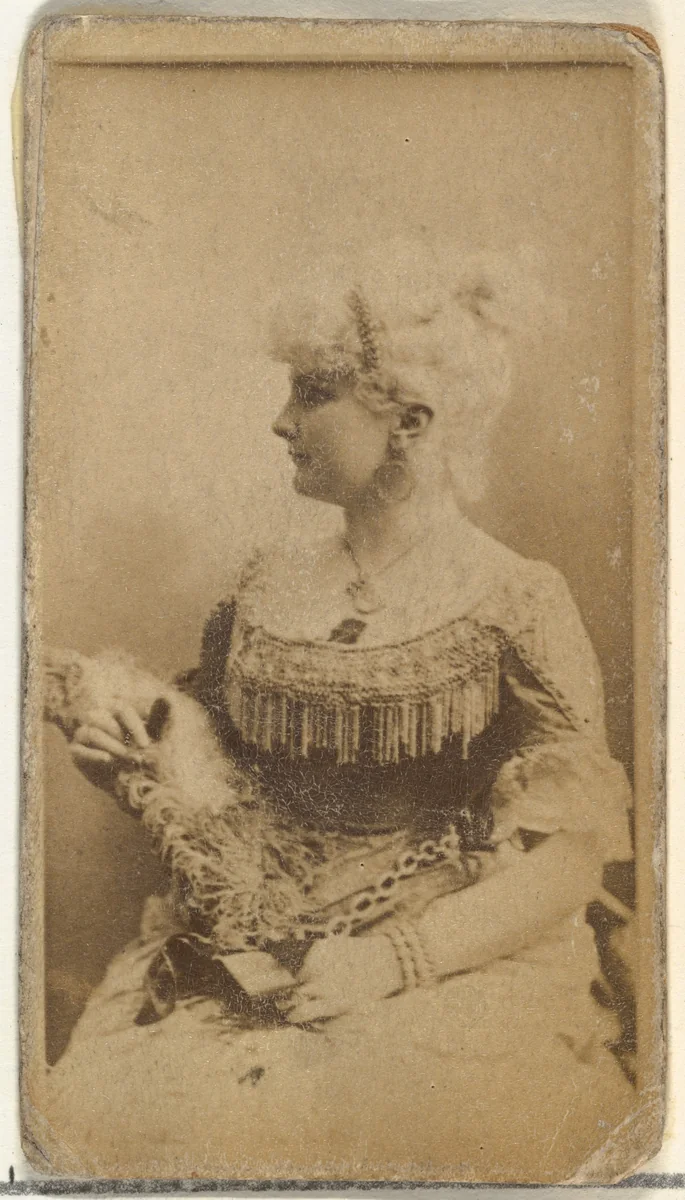 [Actress wearing dress with fringed bodice], from the Actors and Actresses series (N145-8) issued by Duke Sons & Co. to promote Duke Cigarettes by W. Duke, Sons & Co., photograph, 1890-1895