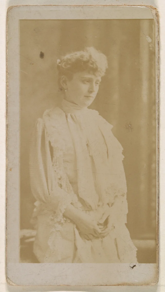 Actress in profile dressed in white gown, from the Actresses series (N245) issued by Kinney Brothers to promote Sweet Caporal Cigarettes by Kinney Brothers Tobacco Company, photograph, 1890