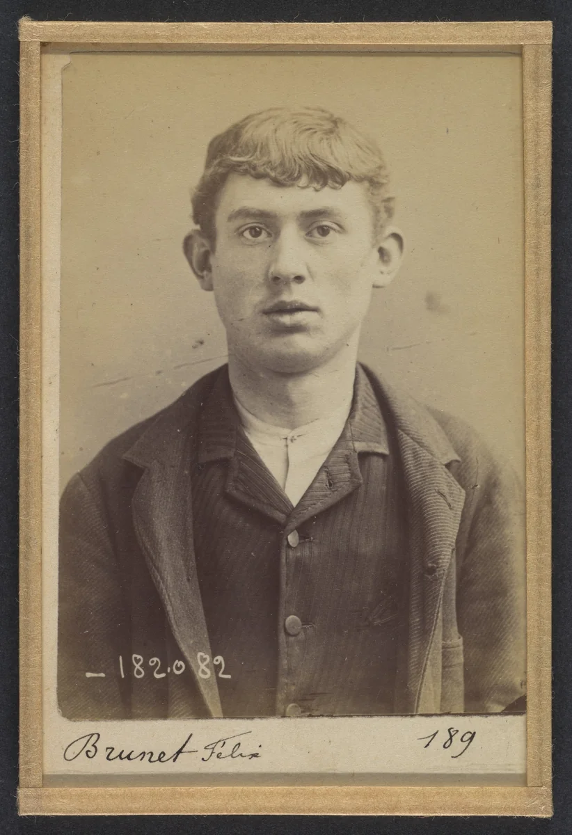 Brunet. Felix. 21 ans, né le 21/2/73 à Paris XVe. Peintre en voiture. Anarchiste. 7/7/94. by Alphonse Bertillon, photograph, 1894