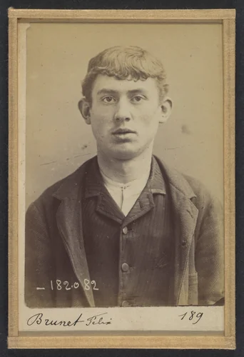 Brunet. Felix. 21 ans, né le 21/2/73 à Paris XVe. Peintre en voiture. Anarchiste. 7/7/94. by Alphonse Bertillon, photograph, 1894