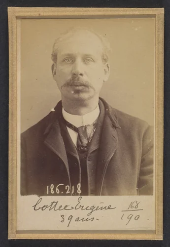 Cottée. Edouard, Eugène. 37 ans, né à Paris XVle. Artiste-peintre. Vol par complicité. 6/2/92. by Alphonse Bertillon, photograph, 1892