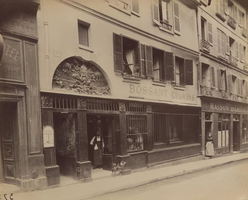 Au Soleil d'Or. 84 Rue Saint-Sauveur by Eugène Atget, photograph, 1899
