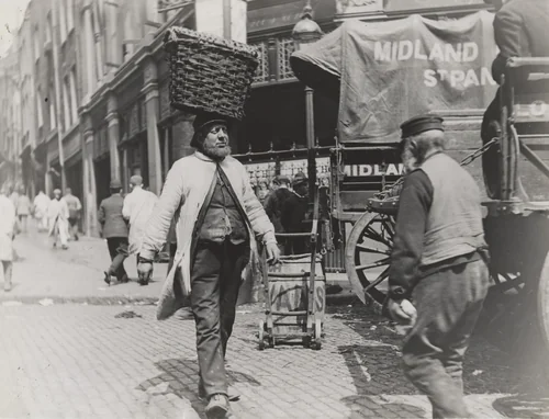 Porter Carrying a Basket of Shrimps, Billingsgate by Paul Martin, photograph, 1893