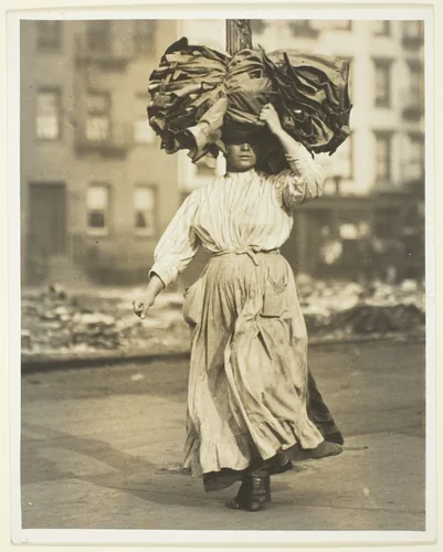 First Work in America, Italian Immigrant Carries Garments To The Tenement Home by Lewis Wickes Hine, photograph, 1910