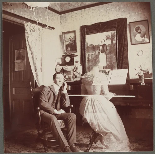 Untitled (Man with female "ghost" at the piano) by American 20th Century, photograph, 1890-1910