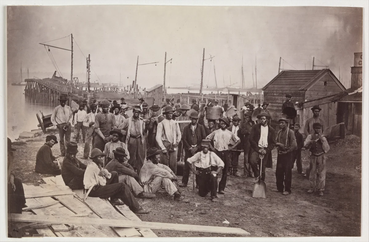 Laborers at Quartermaster's Wharf, Alexandria, Virginia by Andrew Joseph Russell, photograph, 1863-1865