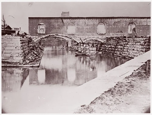 [Canal and Ruins of Richmond and Danville Railroad Depot, Richmond, Virginia] by Alexander Gardner, photograph, 1865