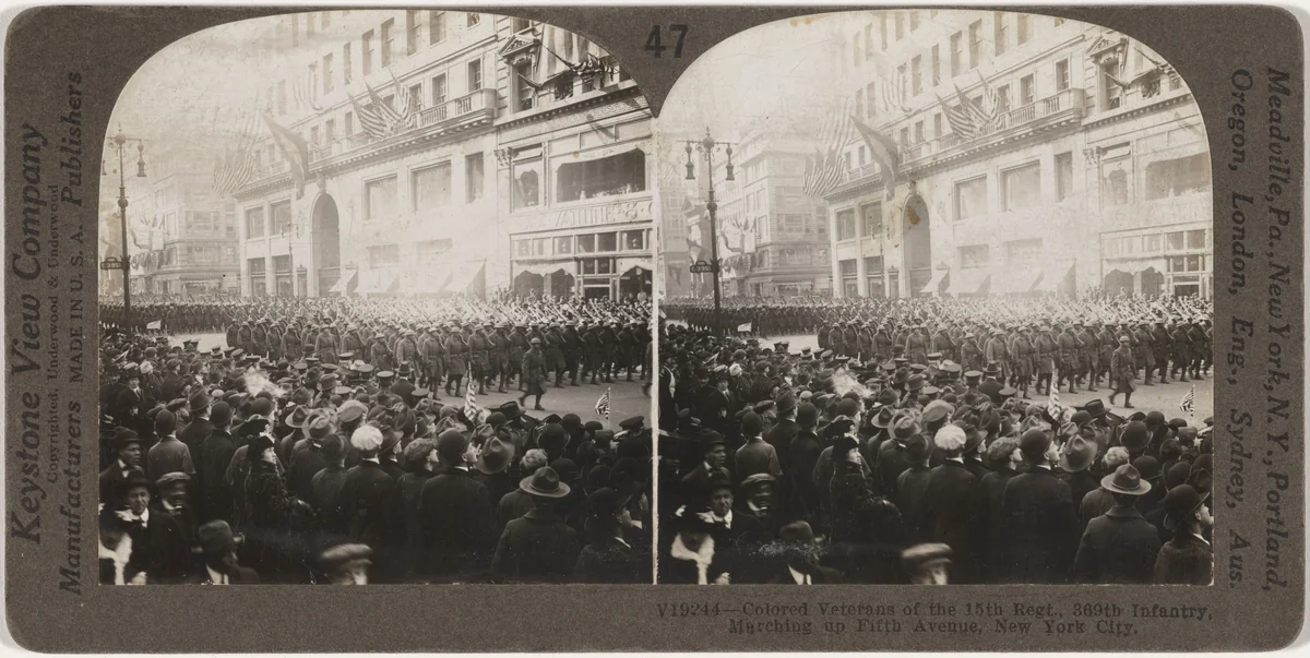 "Colored Veterans of the 15th Regiment, 369th Infantry, Marching up Fifth Avenue, New York City" by Keystone View Company, photograph, 1919