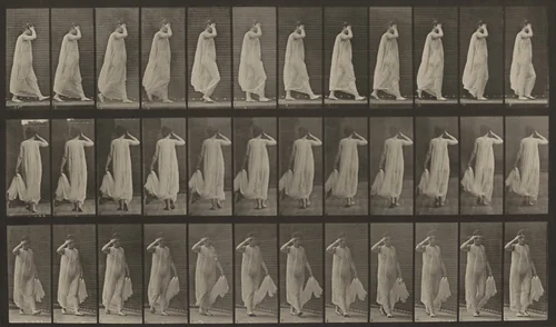 Plate Number 37. Walking; left hand holding dress, right hand at face by Eadweard Muybridge, photograph, 1887