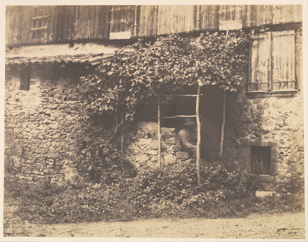 [Rustic Building with Man under Trellis] by André Giroux, photograph, 1851-1855