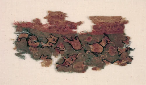 Fragment with Fish and Bird by Unknown, textile, 600-699