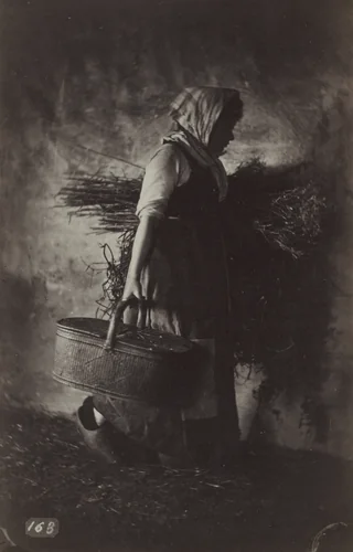Female Peasant Carrying a Basket and Hay by Auguste Giraudon, photograph, 1865-1875