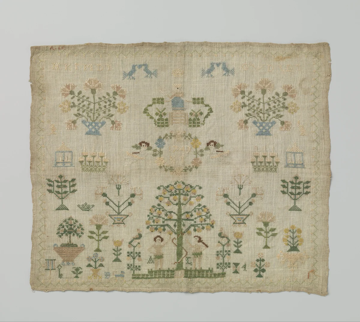 Merklap waarop geborduurd Adam en Eva en het jaartal 1749. by anonymous, textile, 1749
