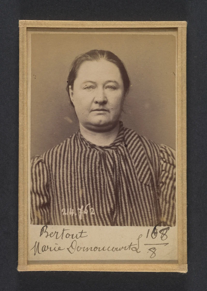 Bertout. Marie, Ismérie. 41 ans, née à Reims. Marchande de vins. Pas de motif. 26/2/94. by Alphonse Bertillon, photograph, 1894