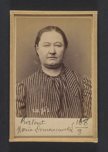 Bertout. Marie, Ismérie. 41 ans, née à Reims. Marchande de vins. Pas de motif. 26/2/94. by Alphonse Bertillon, photograph, 1894