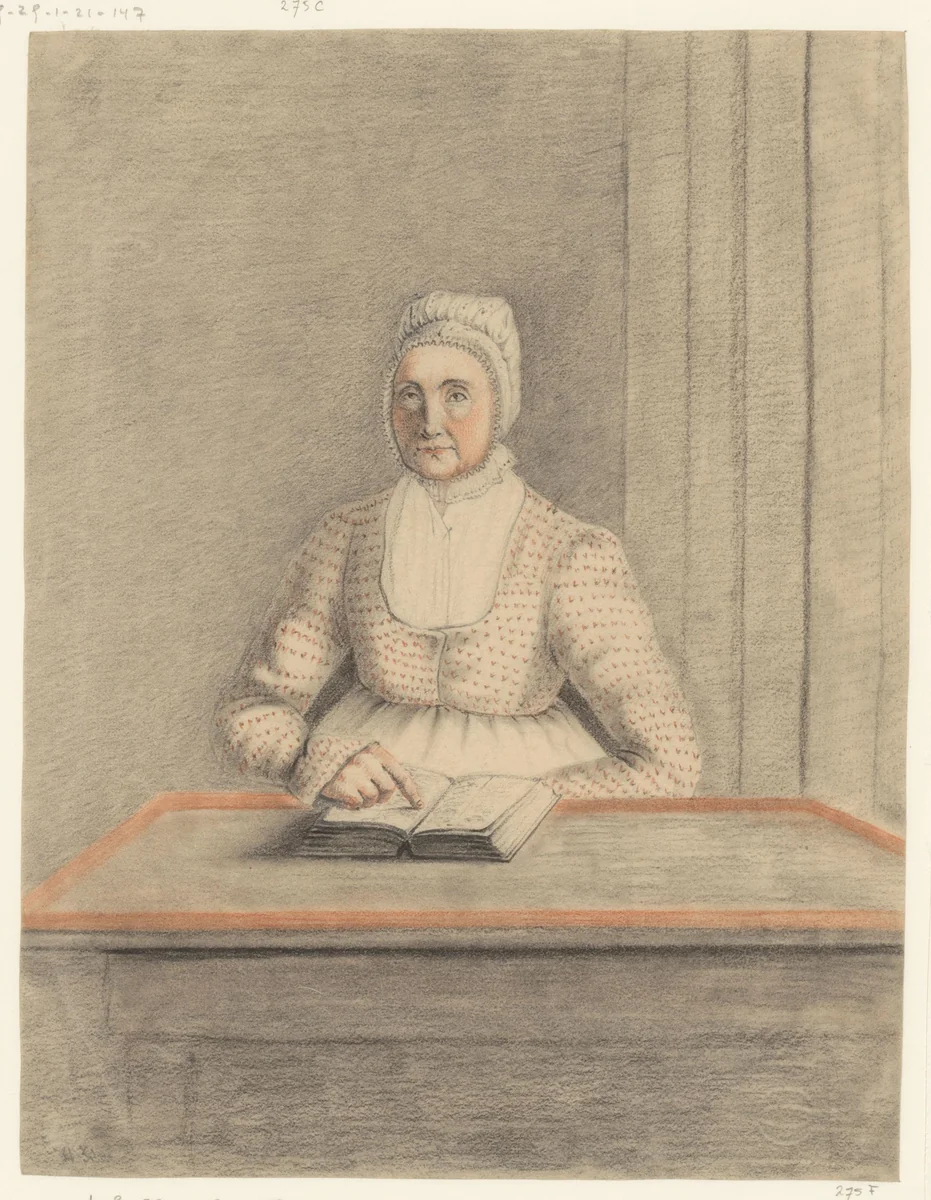 Zittende vrouw aan een tafel met open by anonymous, drawing, 1800-1849