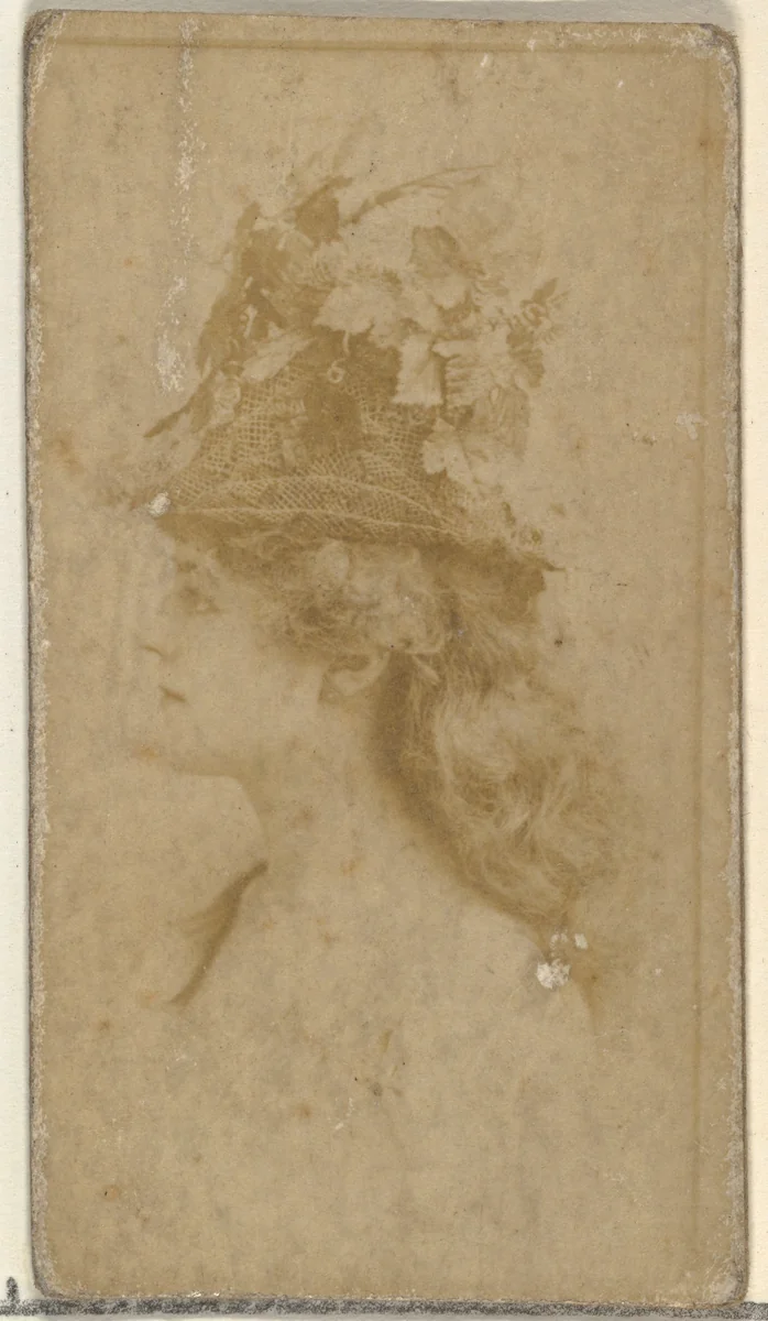 [Actress in profile wearing hat decorated with natural elements], from the Actors and Actresses series (N145-8) issued by Duke Sons & Co. to promote Duke Cigarettes by W. Duke, Sons & Co., photograph, 1890-1895