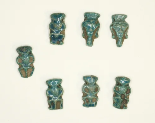 Amulets of the God Bes and the Goddess Hathor by Egyptian, metalwork, -1550--1295