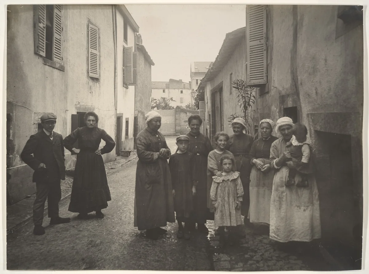 [Group of Adults and Children on a Village Street in the Auvergne] by Felix Thiollier, photograph, 1905-1914