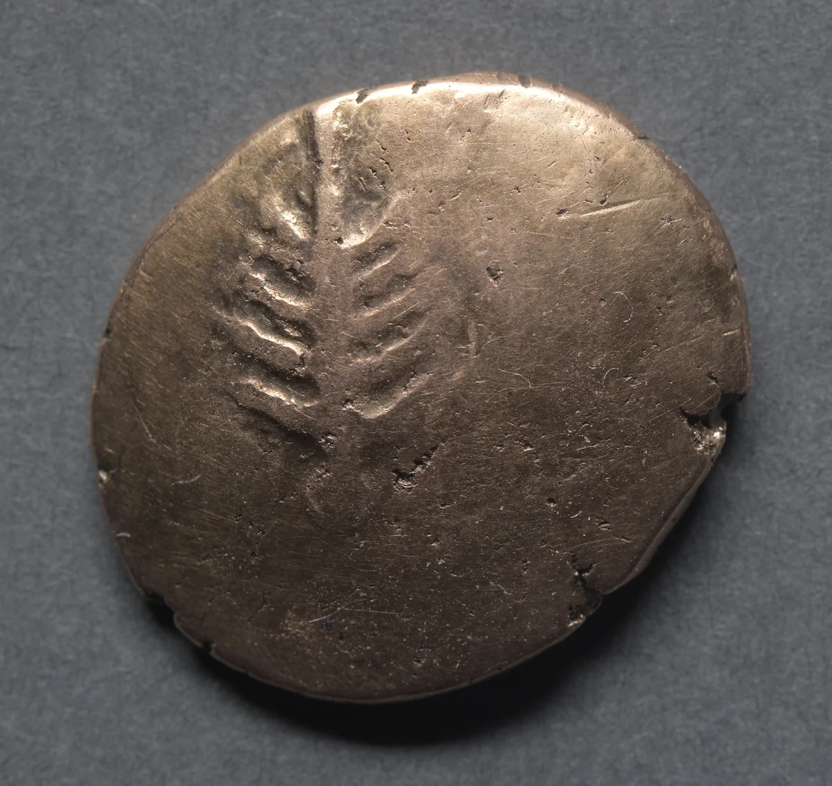 Catti Stater: Horse and Wheel (reverse) by Unknown, metalwork, 20-45