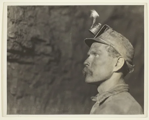 "Follow The Gleam", Welsh Miner in Pa. Coal Mine A Mile From Daylight by Lewis Wickes Hine, photograph, 1910