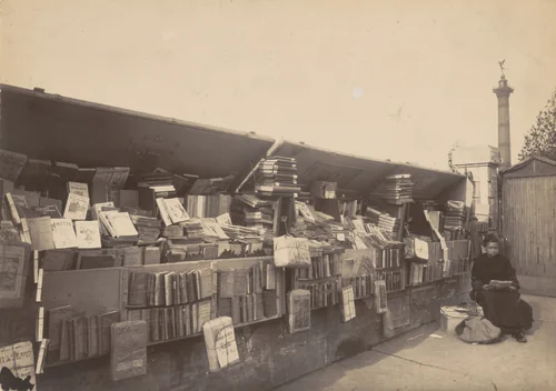 Place de la Bastille, bouqiniste by Eugène Atget, photograph, 1910