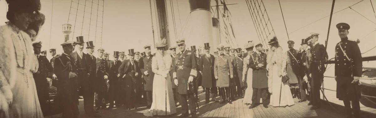 Peter Stolypin, Queen Alexandria of England, Count V. Fredericks, Grand Duchess H. Vladimirovna, Emperor Nicholas II talking to Princess Victoria, Grand Duke M. Alexandrovich, Admiral J. Fisher with Queen Alexandra, on Deck, Reval by Unidentified Photographer, photograph, 1909