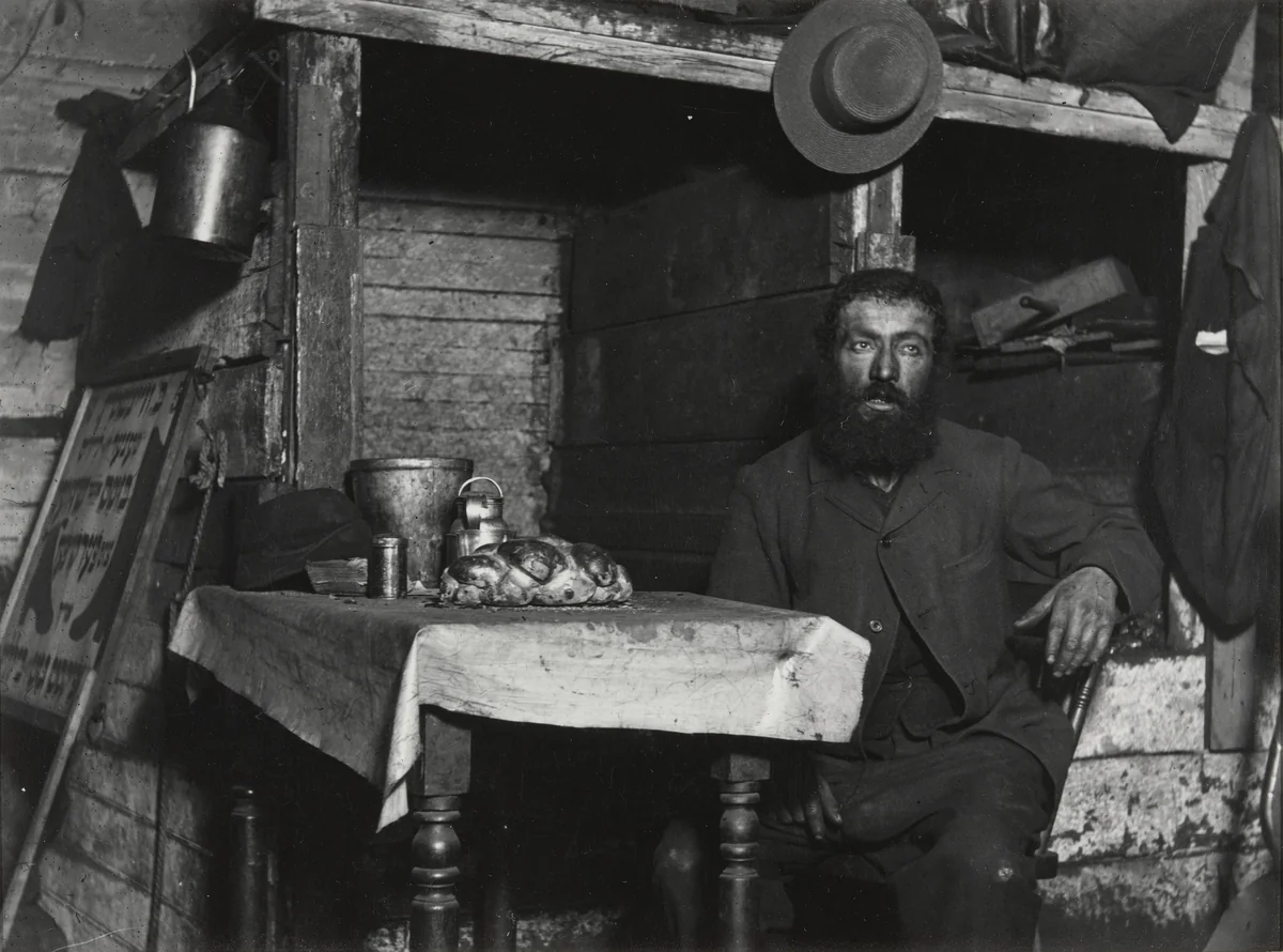 Sabbath Eve in a Coal Celler, Ludlow Street by Jacob August Riis, photograph, 1888