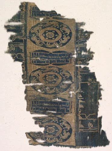 Fragment with running animal roundels and kufic inscriptions by Unknown, textile, 1530-1950
