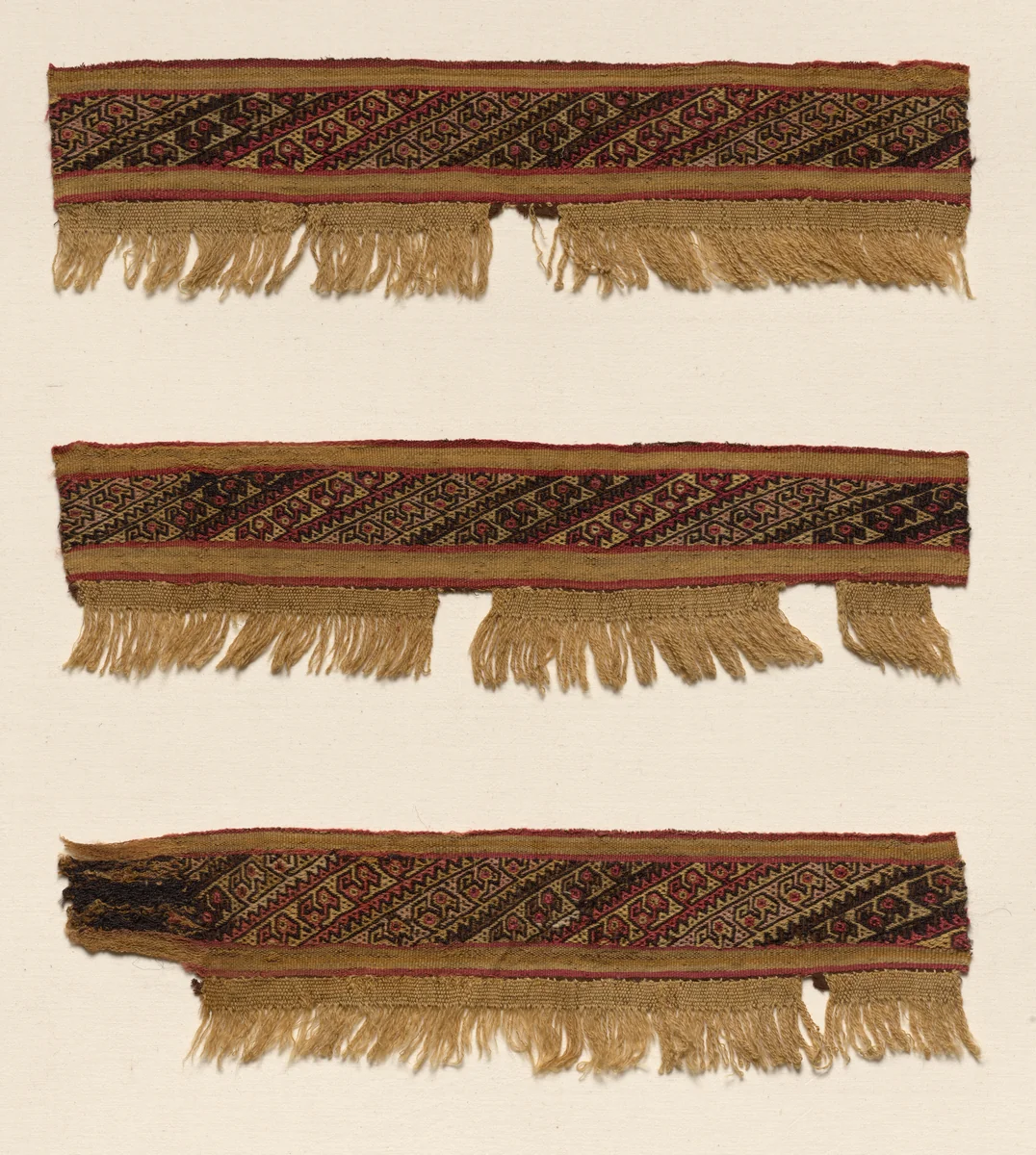 Three Fragments of a Border by Unknown, textile, 1100-1400