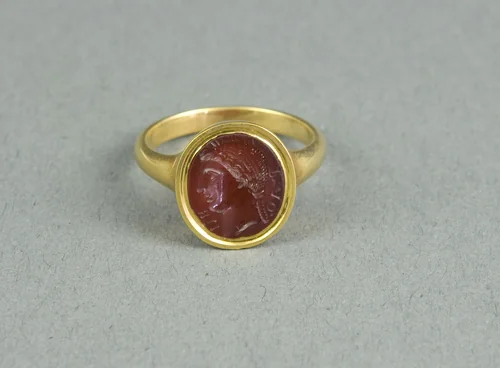 Finger Ring with Intaglio Depicting the Head of a Woman by Roman, metalwork, 100