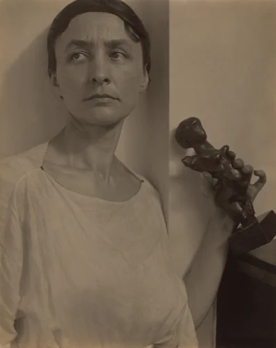 Georgia O'Keeffe with Matisse Sculpture by Alfred Stieglitz, photograph, 1921