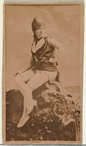[Actress in studio posing on prop boulder], from the Actors and Actresses series (N145-8) issued by Duke Sons & Co. to promote Duke Cigarettes by W. Duke, Sons & Co., photograph, 1890-1895